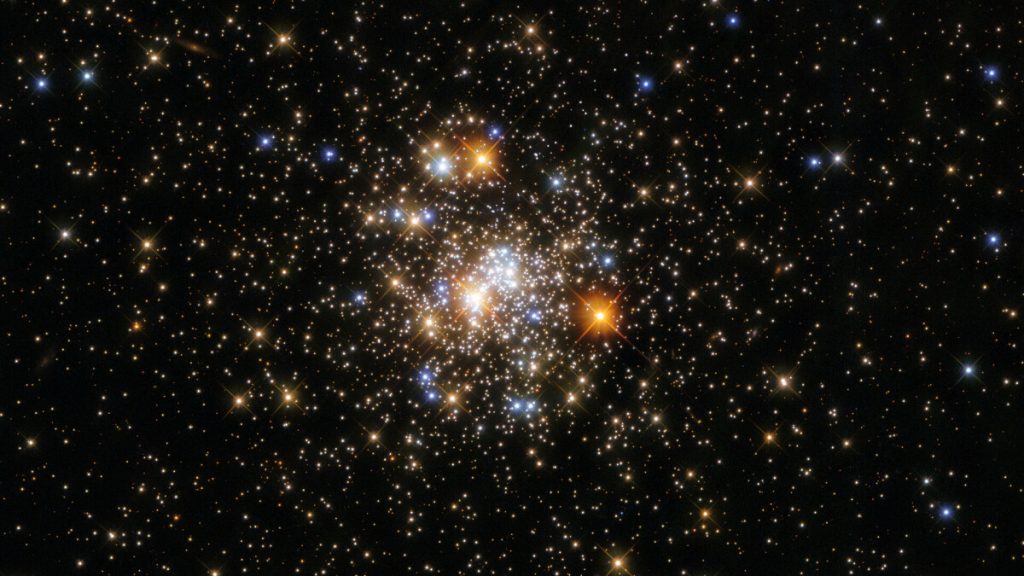 Hubble zooms in on a dazzling cluster of colorfully twinkling stars