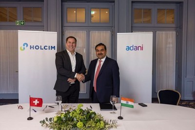 Mr Gautam Adani Chairman Adani Group with Mr Jan Jenisch CEO Holcim Limited (PRNewsfoto/Adani Enterprise Limited)