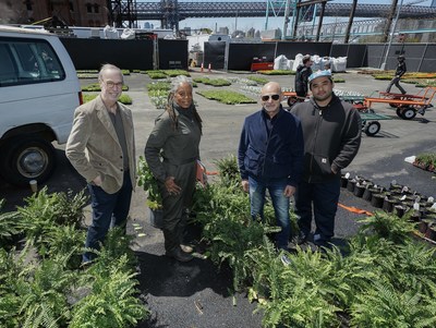 Greening NYC (LtoR): Mark Schienberg (president of the New York Auto Show), Paula Lucus (horticulture program volunteer at PS 811x in the Bronx, NY), Mark Lacher (dealer principal Koeppel Subaru), and Mike Rezny (assistant director of GrownNYC) with donated plants from the New York Auto Show.