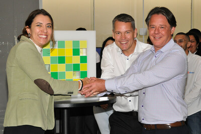 L - R Liciany Ribeiro, CEO of Ribeiro Solar; Frank Jessel, Global Director of the Solar Trade division at BayWa r.e.; and Daniel Marino, Director of Solar Trade in the Americas at BayWa r.e. The three leaders shake hands to celebrate BayWa r.e. Solar Trade announcing the signing of an agreement to acquire Ribeiro Solar, a solar distribution company operating exclusively in Brazil.