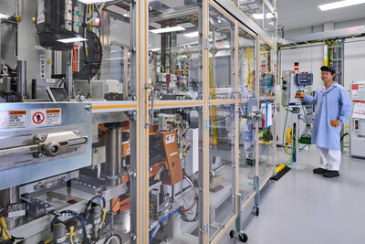 An employee monitors progress of fuel cell electrodes in the stack assembly room at Fuel Cell System Manufacturing LLC, GM and Honda’s fuel cell joint venture in Brownstown, Michigan.